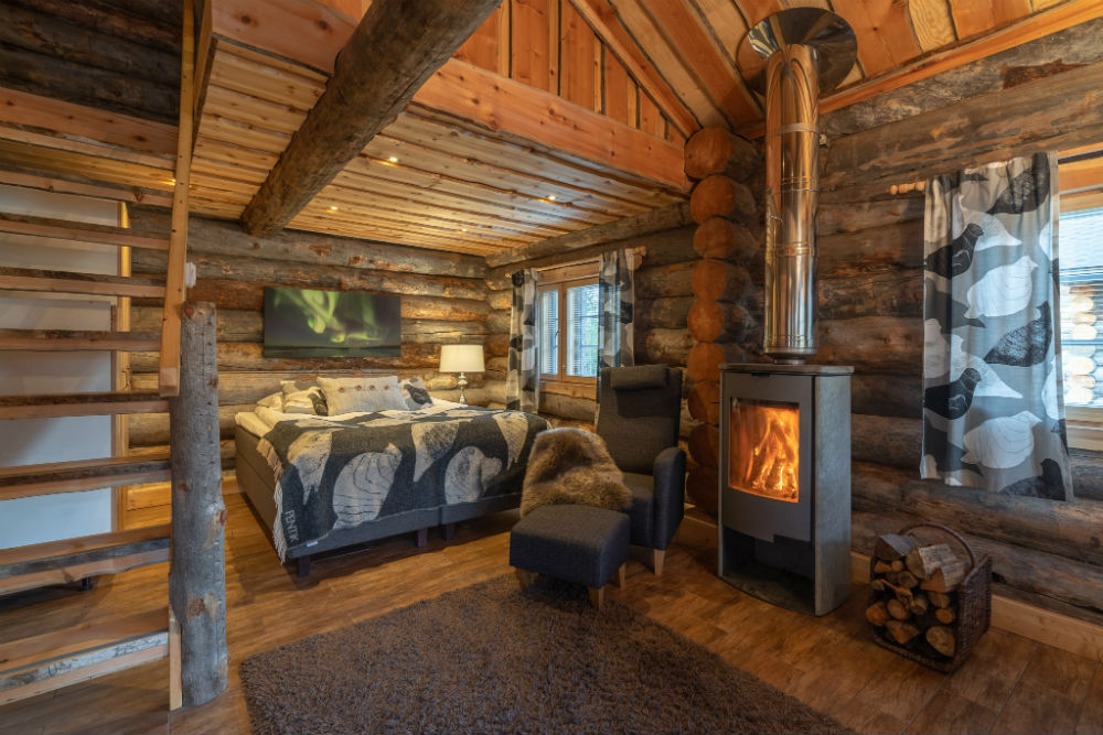 WildernessHotelNellim_logcabin_fireplace