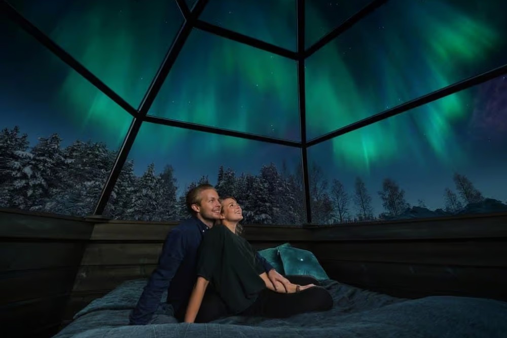Northern-Lights-from-igloo-Glass-Igloos-at-Arctic-SnowHotel-Glass-Igloos-Lehtojarvi-Circle-Rovaniemi-Lapland-Finland-1