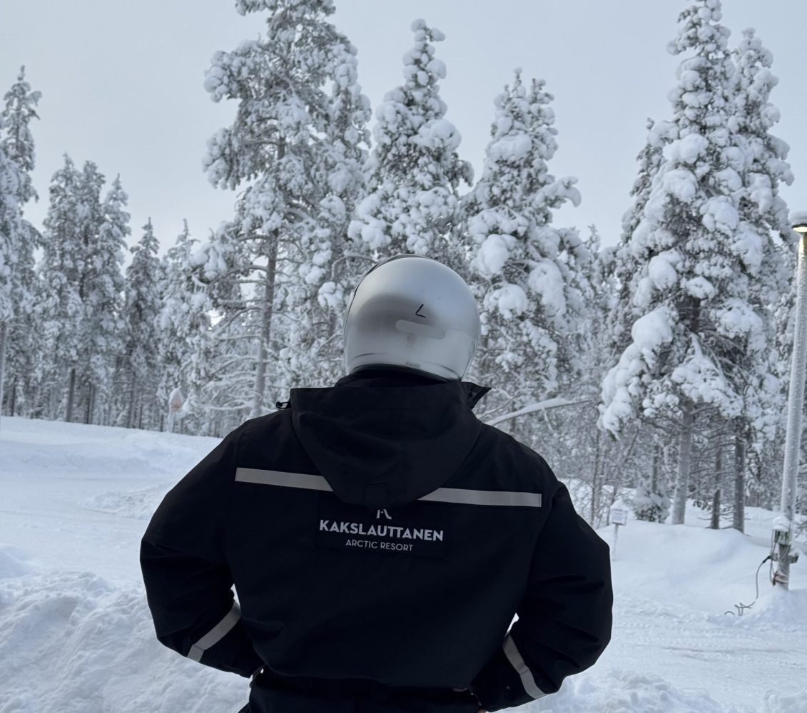 person in thermals in snow covered forest